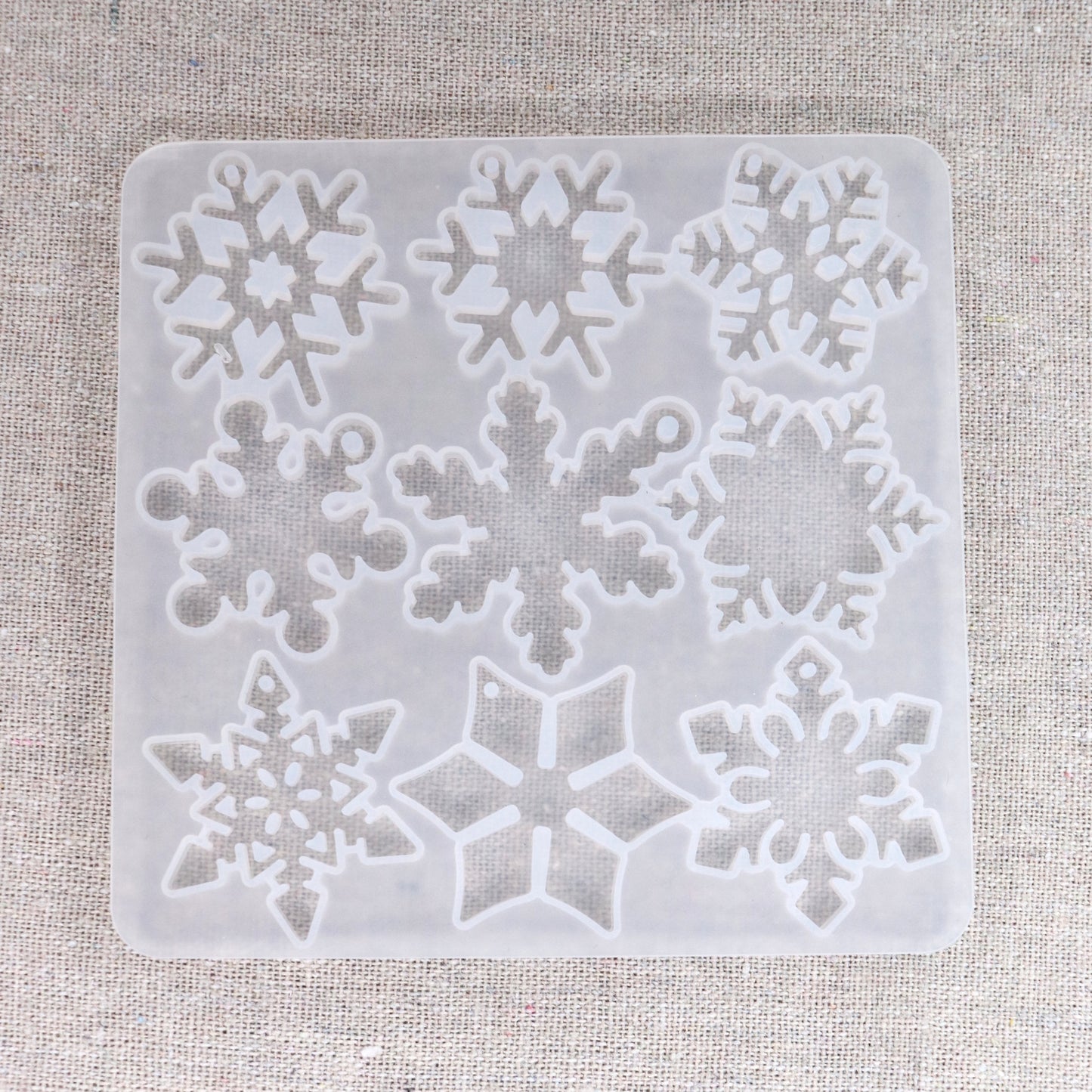 Gießformen mit 12 verschiedene Schneeflocken Anhänger. Weihnachten Dekoration.