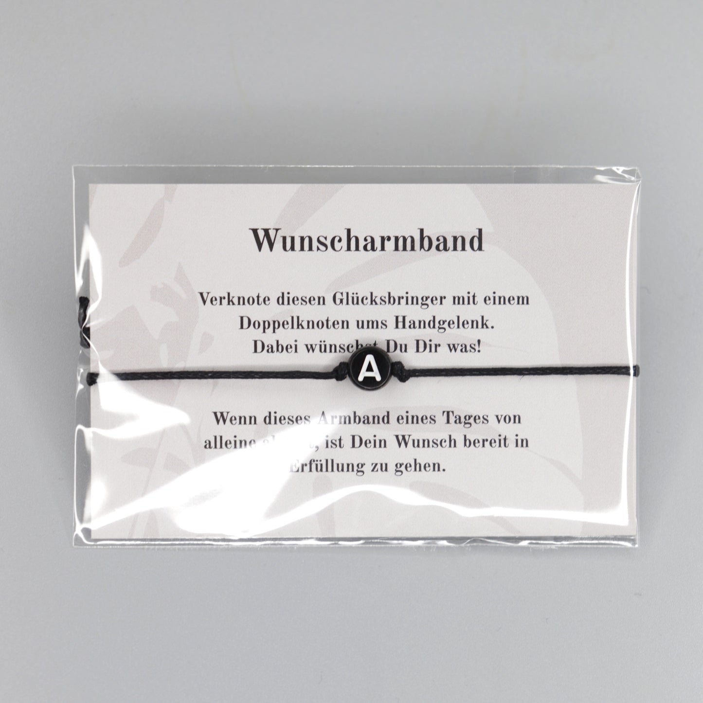 Wunscharmband mit Wunschbuchstabe A aus Acryl. Geschenkideen. Freundschaftsarmbänder. Kleine Geschenke. Verpackt in Folie.