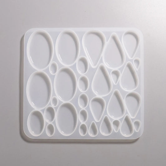 Silikon Gießformen verschieden große flache Ovale- und Tropfen-Formen von ca. 1 cm bis 5 cm
