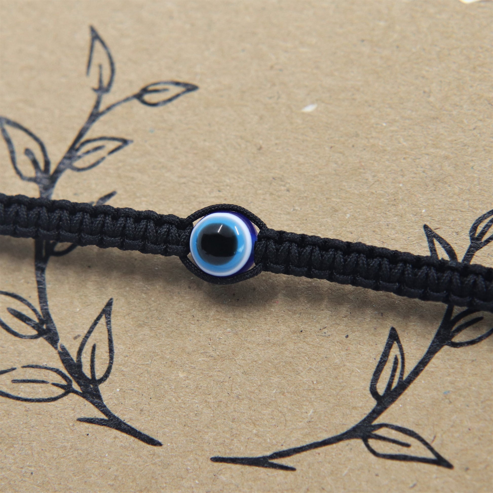 Makramee Armband böser Blick Schutz verstellbar in schwarz aus Nylon und Acryl perle