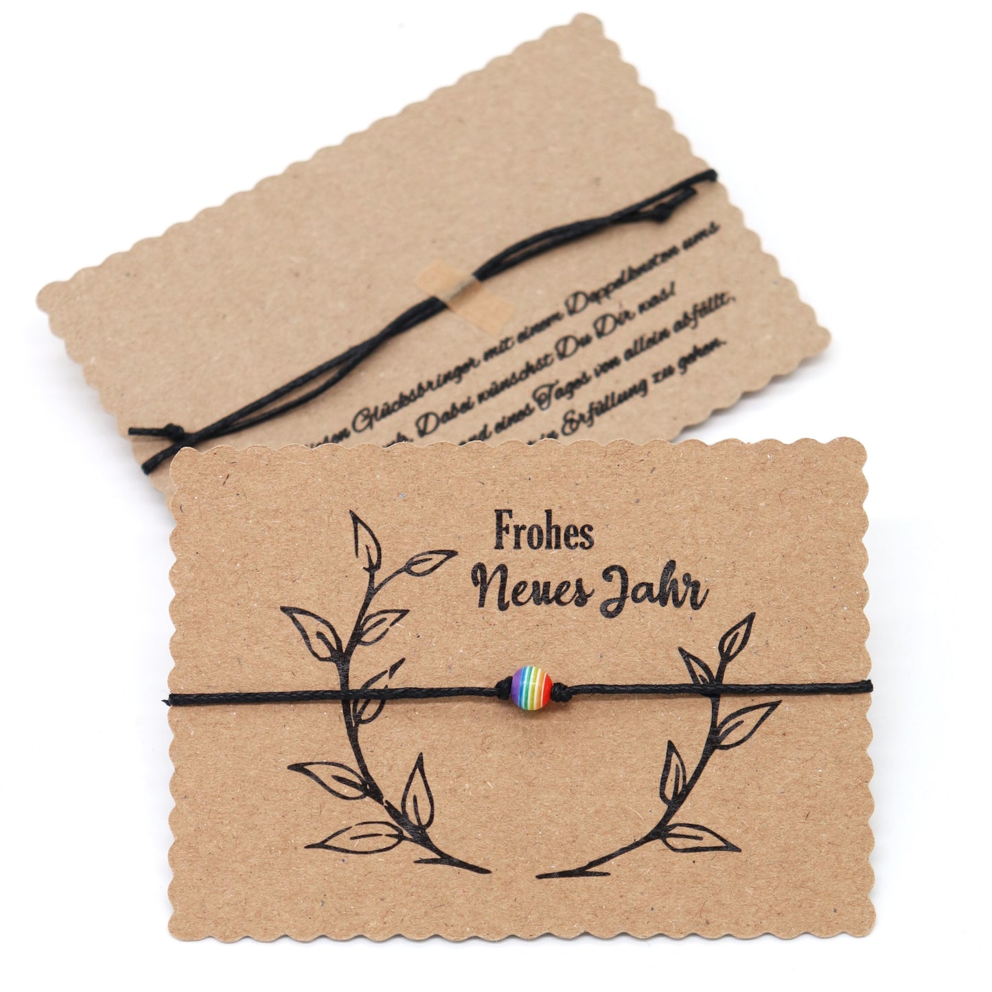 Wunscharmband mit Regenbogen Perle. Karte Frohes neues Jahr.