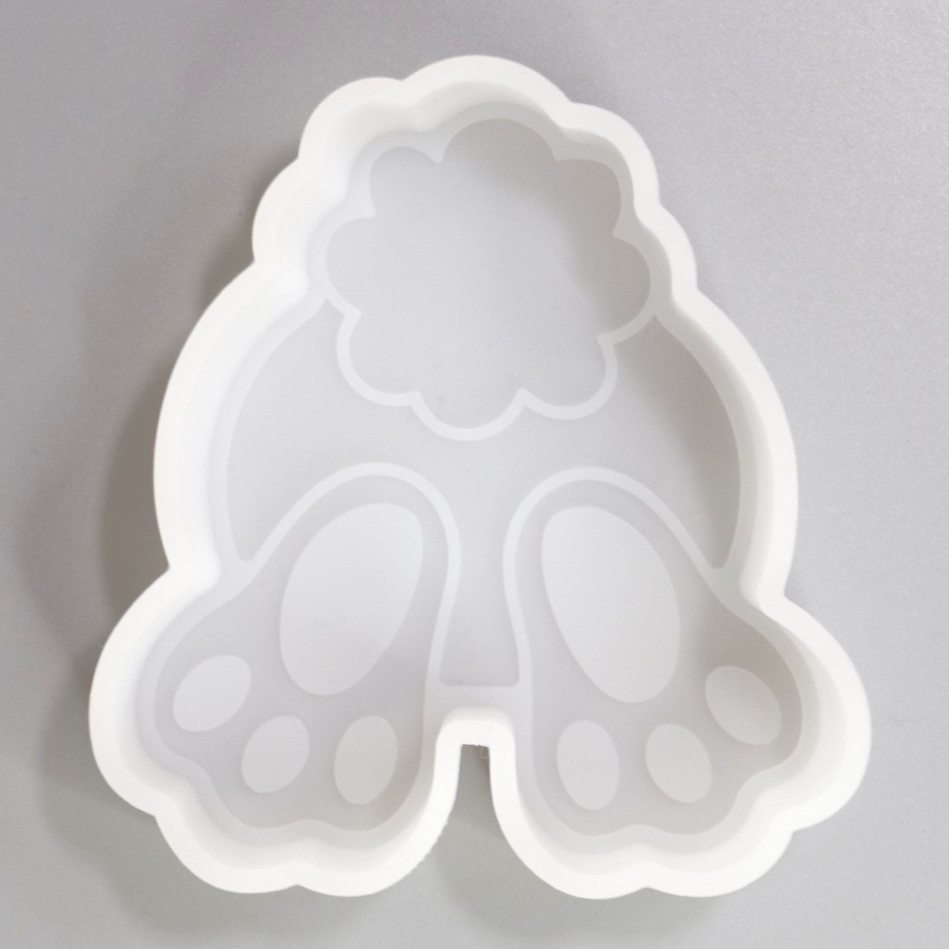 Silikongießform Kanninchen Fußabdruck Rückseite Aufsteller für Ostern Dekorationen. Gießform für Raysin oder Gípspulver. ca. 10 x 9 cm