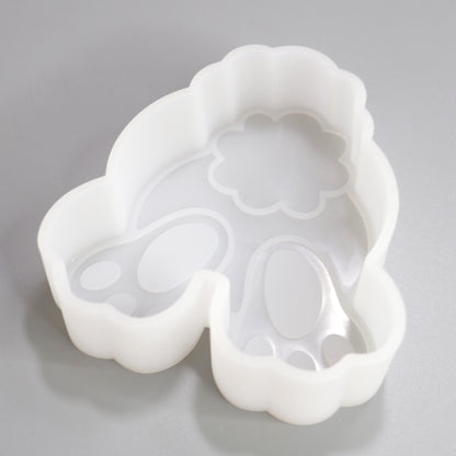 Silikonform Kanninchen Fußabdruck Rückseite Aufsteller für Ostern Dekorationen. Gießform für Raysin oder Gípspulver. ca. 10 x 9 cm. Seitlich Ansicht.