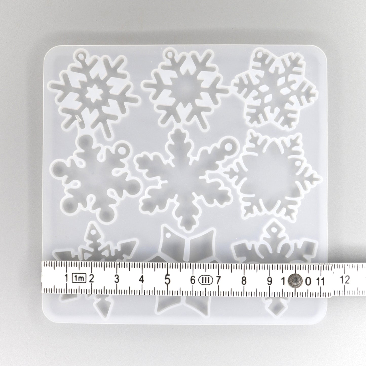 Silikonform mit 12 verschieden Schneeflocken Anhänger kleine. Weihnachten Dekoration.
