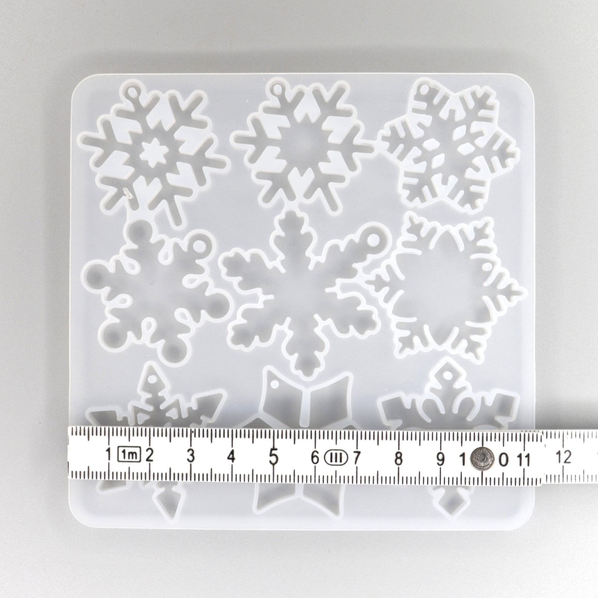 Silikonform mit 12 verschieden Schneeflocken Anhänger kleine. Weihnachten Dekoration.