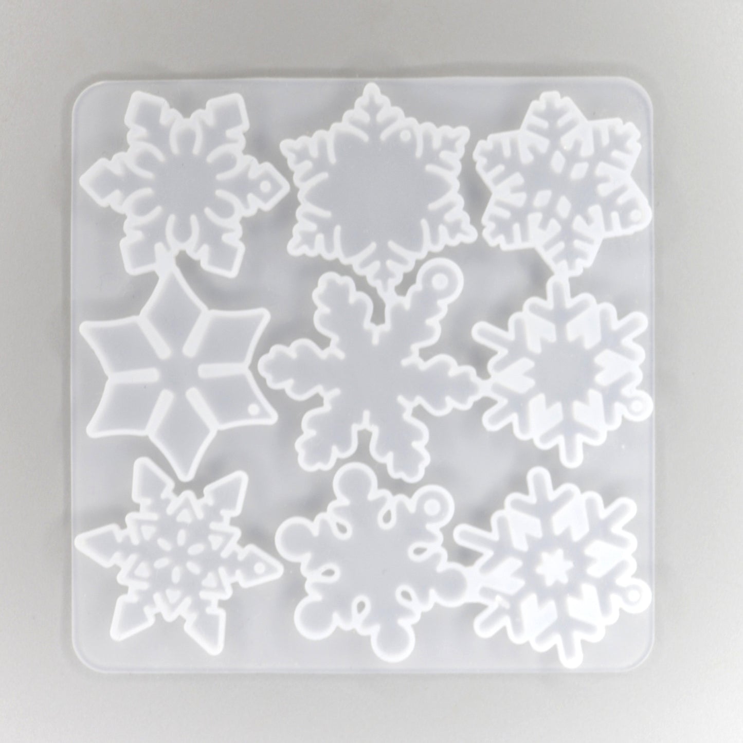 Gießformen mit 12 verschiedene Schneeflocken Anhänger. Weihnachten Dekoration.