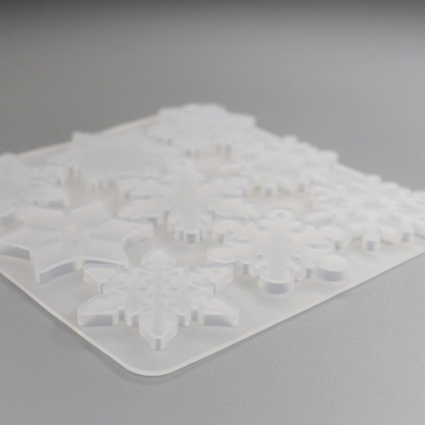 Gießformen mit 12 verschiedene Schneeflocken Anhänger. Weihnachten Dekoration.