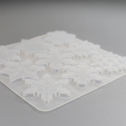 Gießformen mit 12 verschiedene Schneeflocken Anhänger. Weihnachten Dekoration.