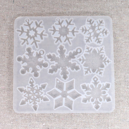 Gießformen mit 12 verschiedene Schneeflocken Anhänger. Weihnachten Dekoration.