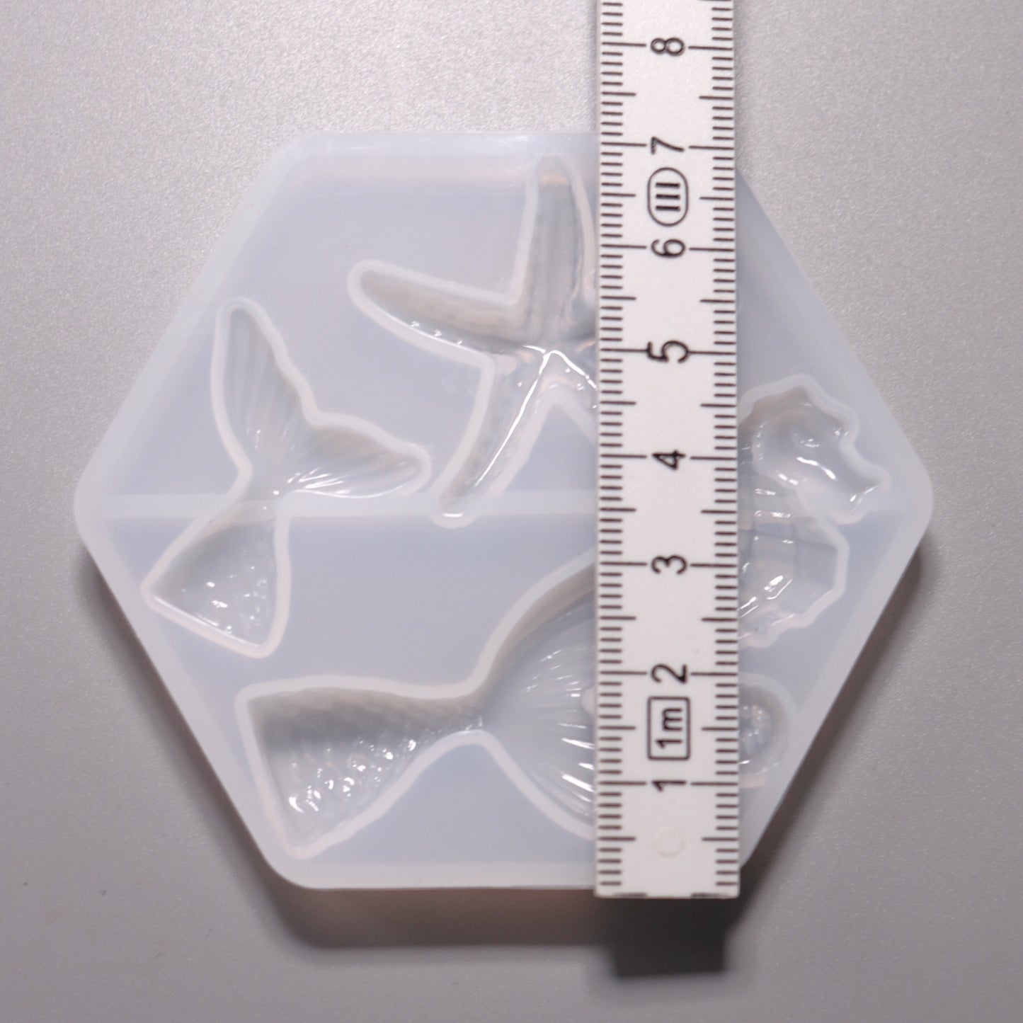 Silikon Gießform Seepferdchen, Seestern, Fischflossen ca. 2 bis 4 cm. Ansicht mit Lineal.